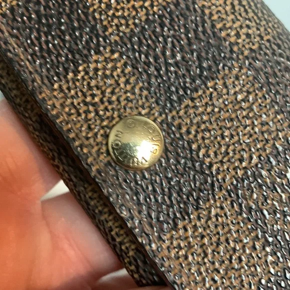 1999 authentic Louis Vuitton 4-ring key holder